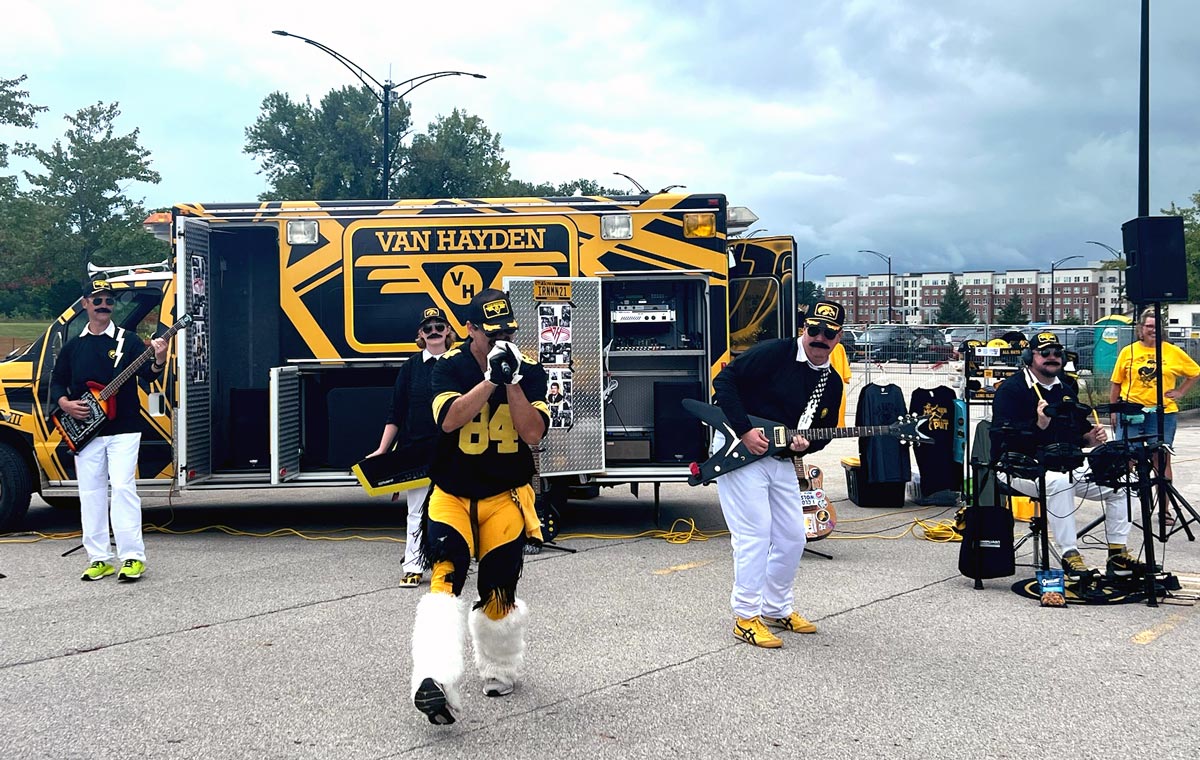 Van Hayden Band performing in front of the Vanbulance at FRYfest