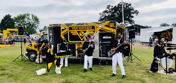 Van Hayden Band performing in front of the Vanbulance at the Fayette County Fair